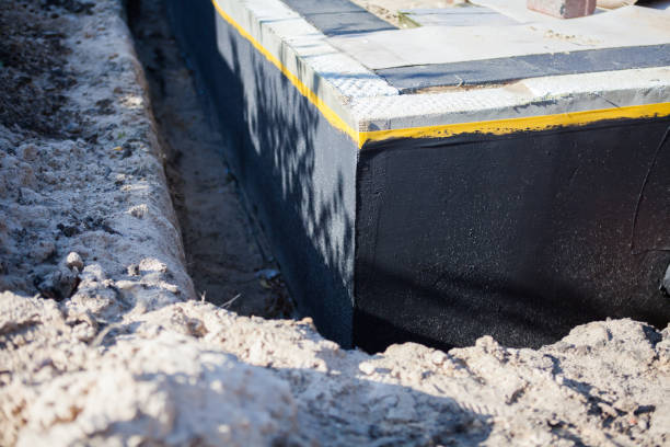Professional Interior Drainage System technician working in Hartsville, IN